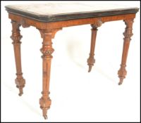 A 19th Century Victorian walnut rectangular fold-over top card table, quarter veneered top, hinged