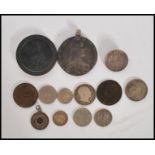 A collection of coins dating from the 18th century onwards to include a 1797 cartwheel, a 1780 Maria