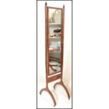 An Edwardian mahogany inlaid cheval dressing mirror of rectangular form, set within upright inlaid