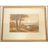 A late 19th / early 20th Century watercolour on paper depicting a country estate overlooking the