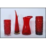 A group of four mid 20th Century vintage retro studio ruby red glass vases to include two bark