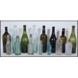Glass bottles (15). Assortment of green / clear all antique or vintage. Various shapes & sizes.