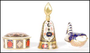 A group of three 20th Century Royal Crown Derby Imari pattern China pieces to include a candle