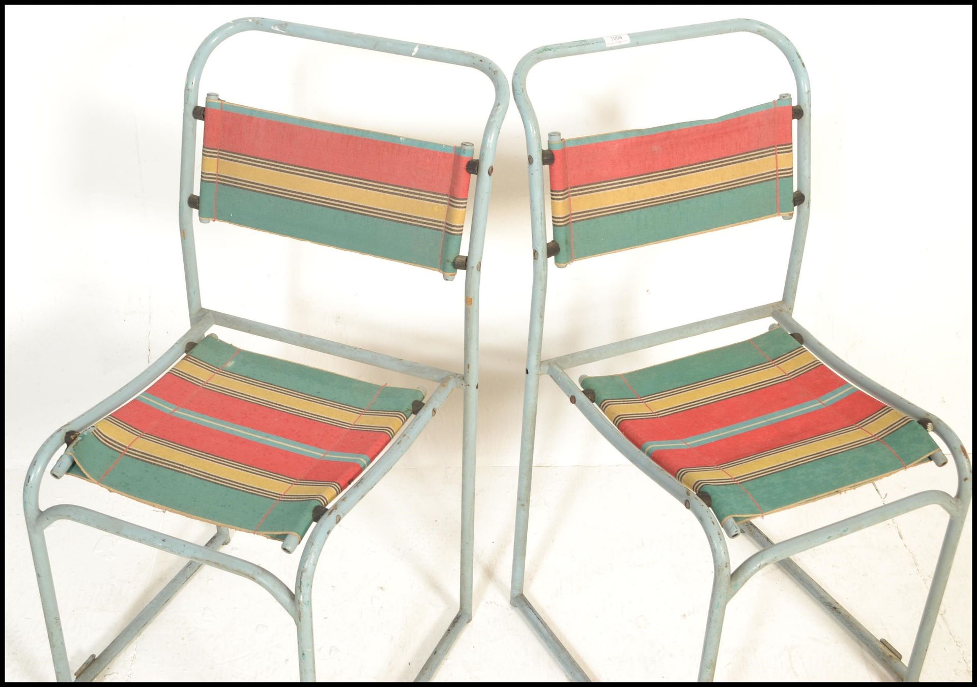 A pair of vintage mid 20th Century metal tubular village hall dispersal chairs, upholstered with a - Bild 2 aus 5