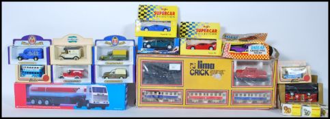 A collection of boxed diecast model cars and lorries to include Esso Road Tanker, Oxford die cast,