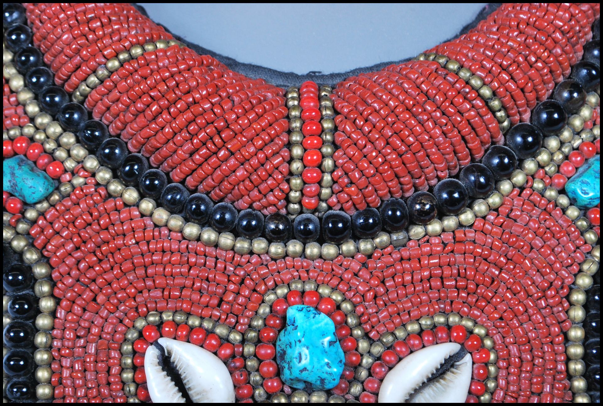 A 20th Century Tibetan tribal collar necklace constructed from a fabric panel stitched with red - Image 4 of 17