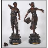 A pair of 19th Century high Victorian bronzed spelter figures modelled as a male and female farm