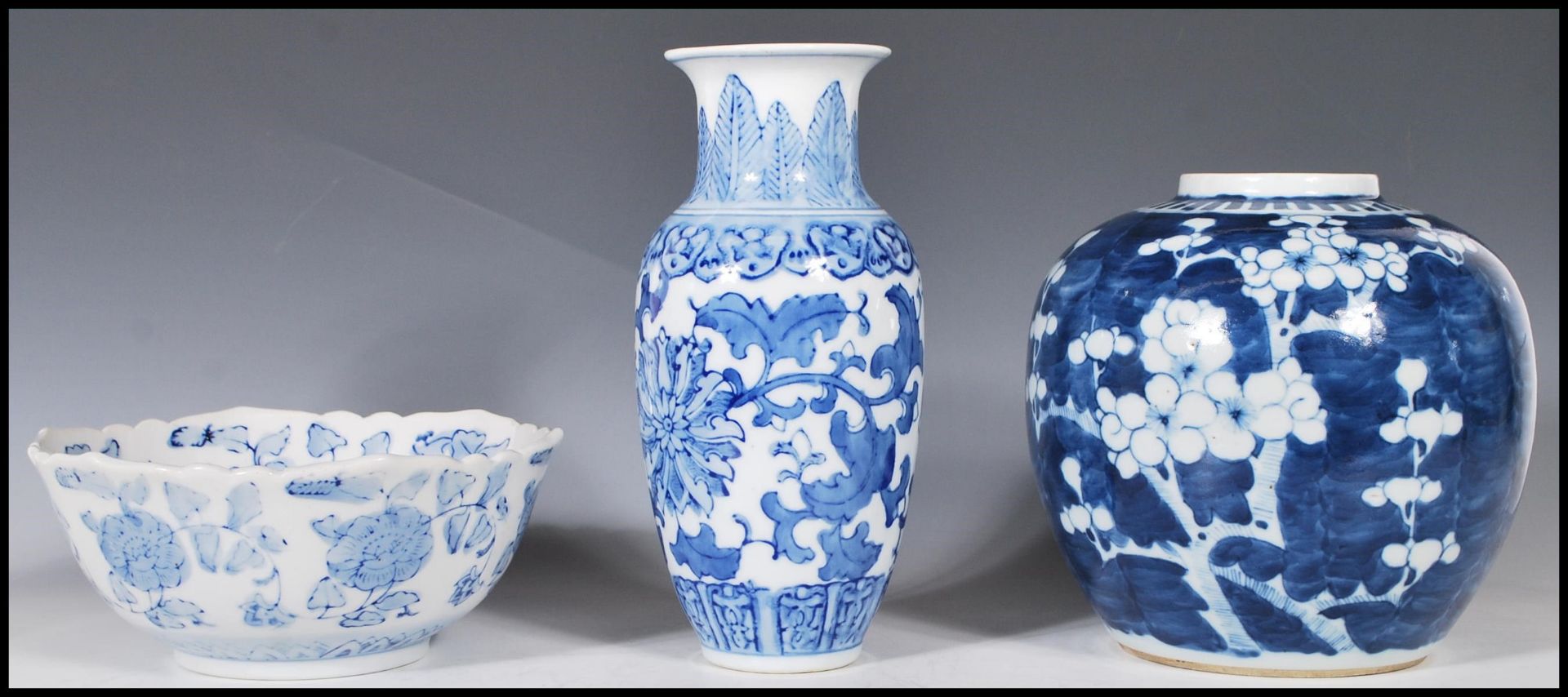 A 19th Century Chinese ginger jar of large proportions and bulbous form being hand painted in blue