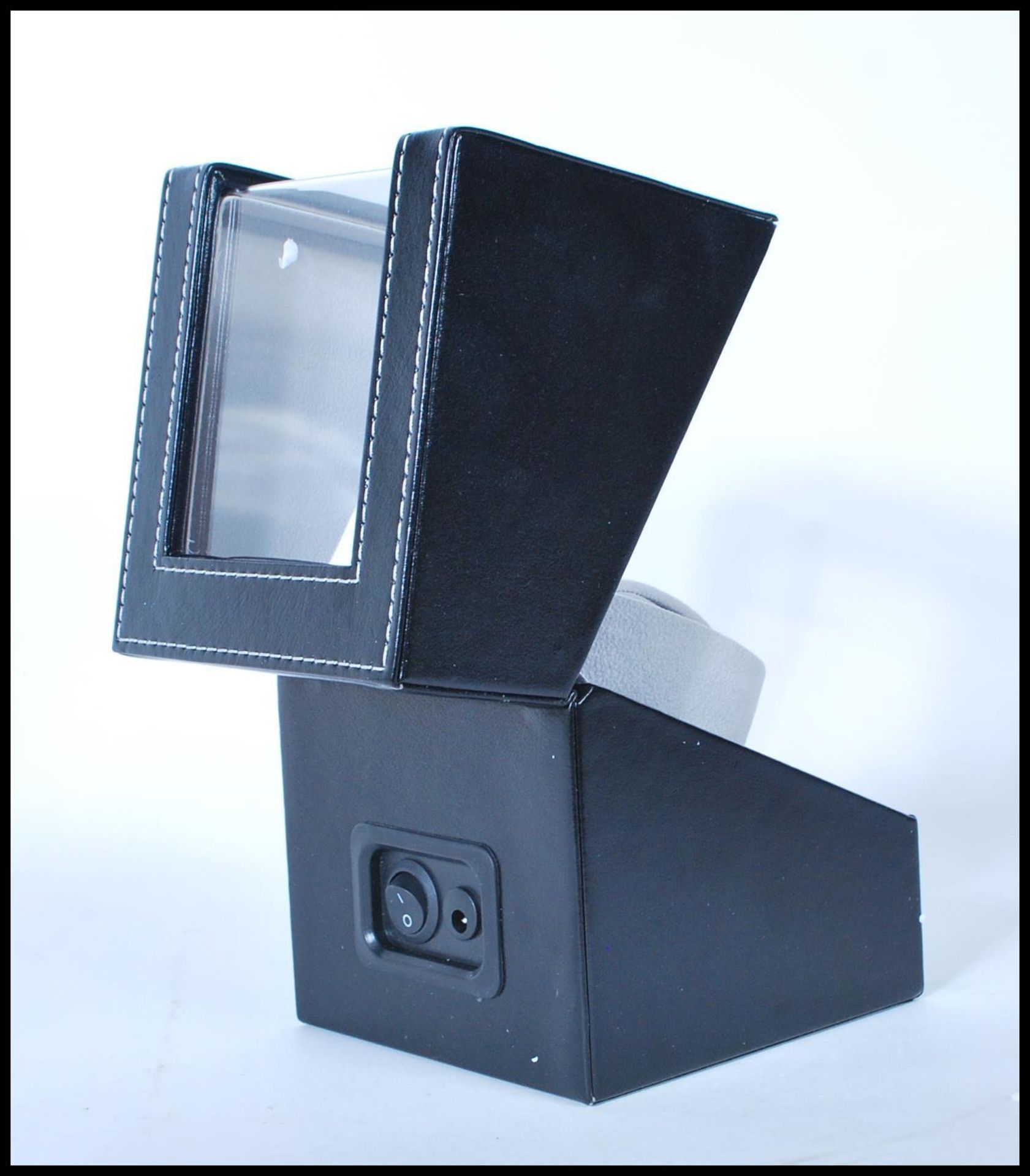 A contemporary leather housed single cushion automatic watch winder, hinged top with single - Image 4 of 4