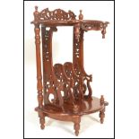 A 20th Century mahogany antique style hall side table canterbury magazine stand of two tier demi