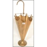 A 20th Century hammered brass antique style umbrella / stick stand in the form of an umbrella having