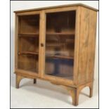 A 19th Century Victorian Industrial office library glazed scrubbed pine bookcase. The reeded edge