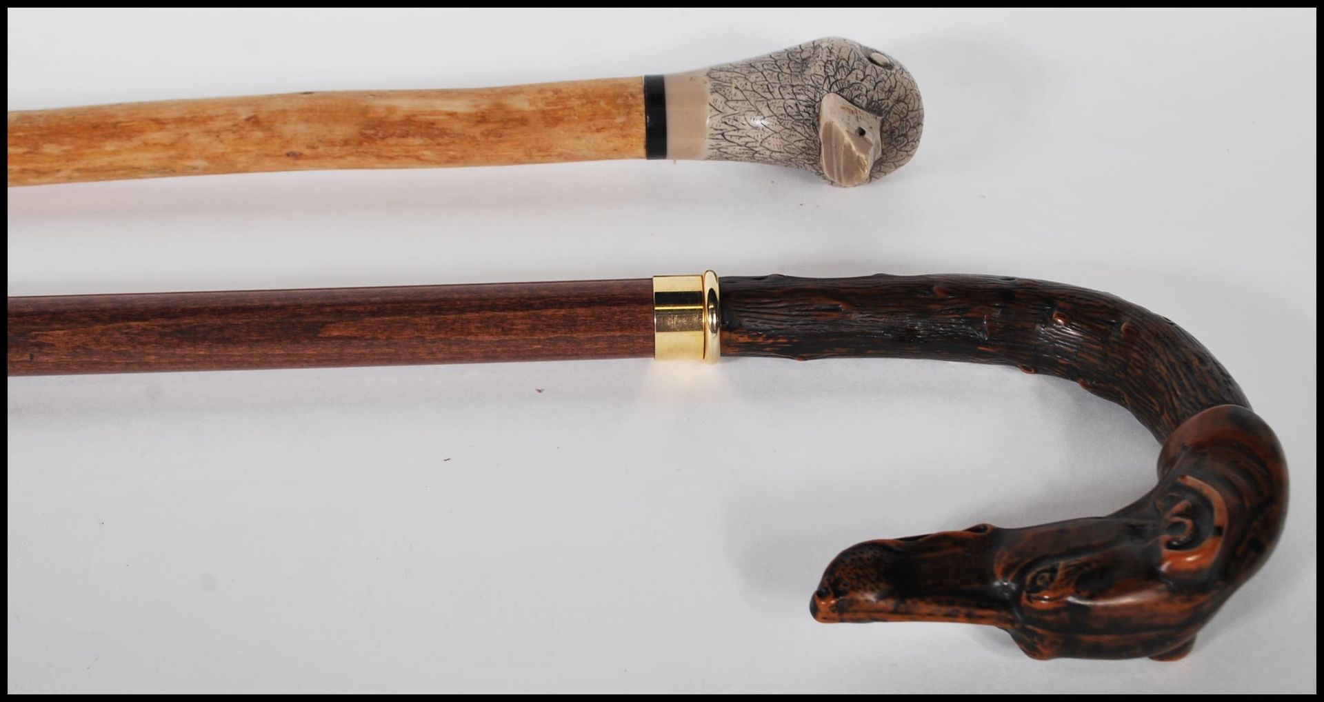 Two  20th Century walking stick canes to include a walking stick with a faux wooden handle in the - Bild 5 aus 5