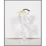 Swarovski - Silver Crystal - a cut glass crystal figurine of a Heron / crane raised on a