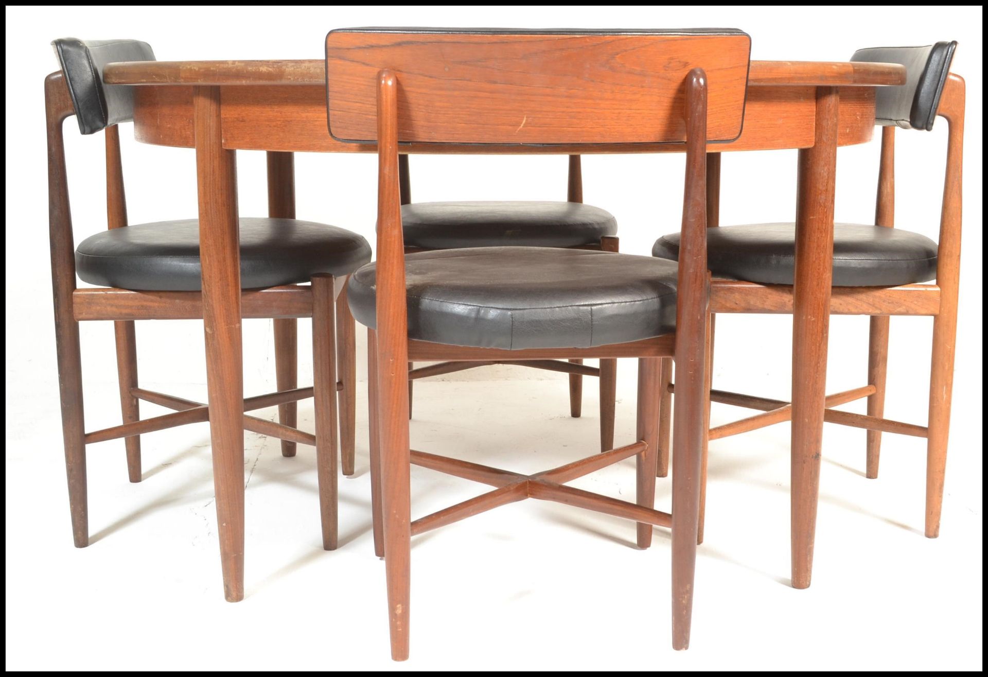 Victor B. Wilkins - G-Plan - A 1960's retro vintage dining suite comprising of a Fresco teak wood