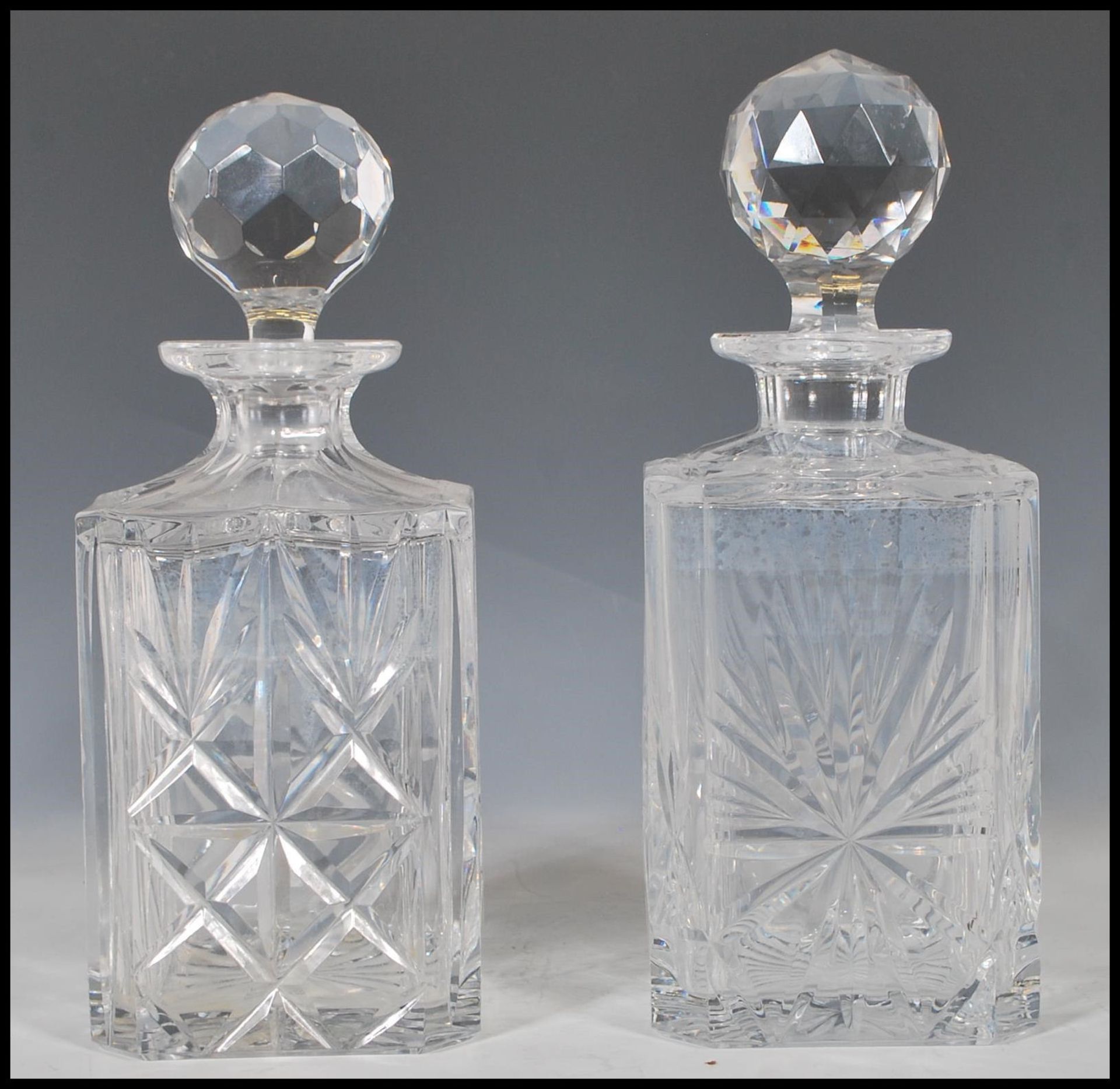 A selection of 20th Century cut glass crystal decanters of various forms all having they're original - Bild 2 aus 15