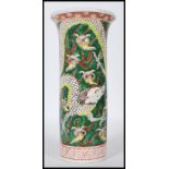 A 20th Century Chinese famille verte vase of flared cylindrical form having hand enamelled dragon