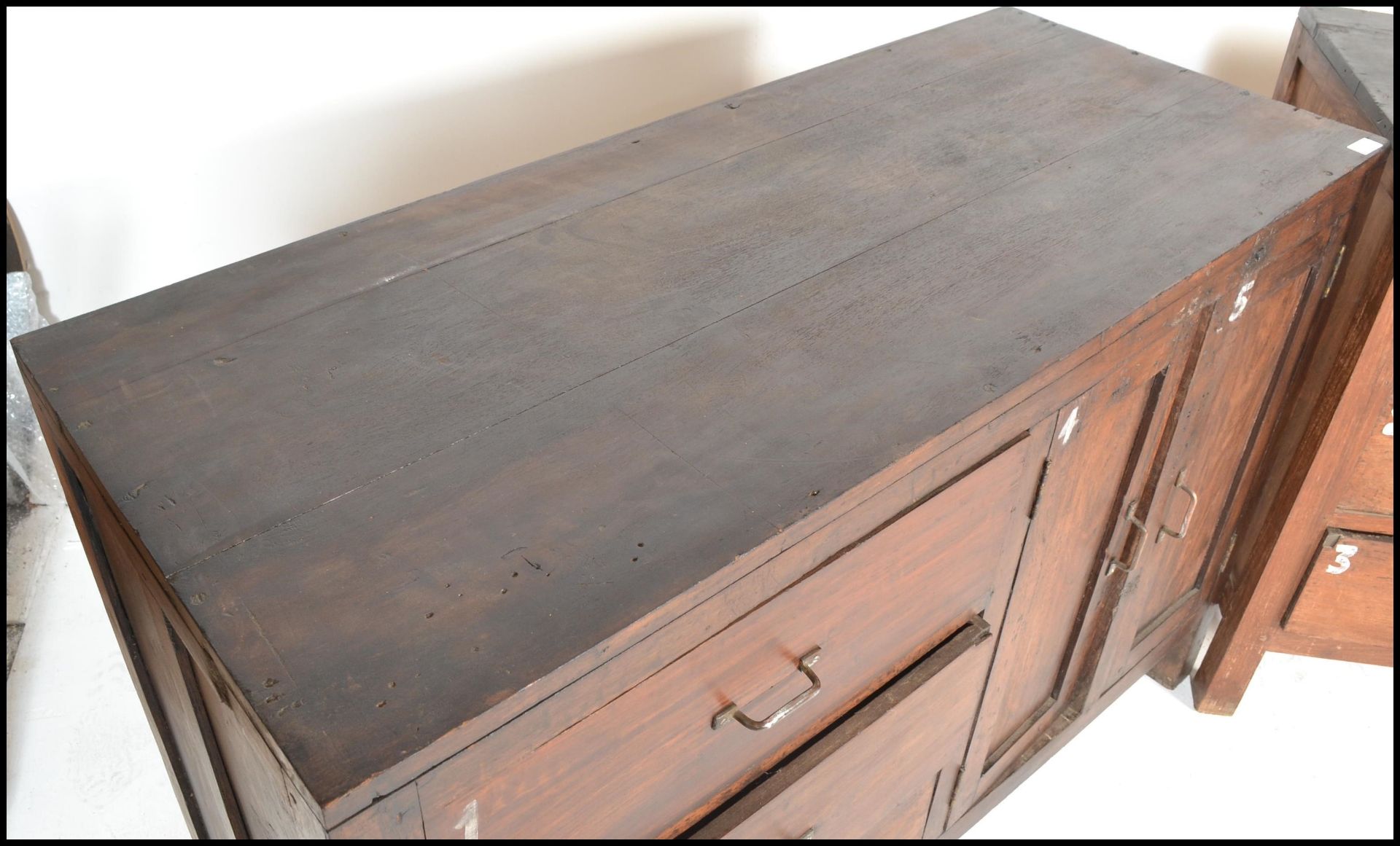 A pair of unusual 20th century hardwood sideboard cabinets of hardwood construction being raised - Bild 12 aus 17