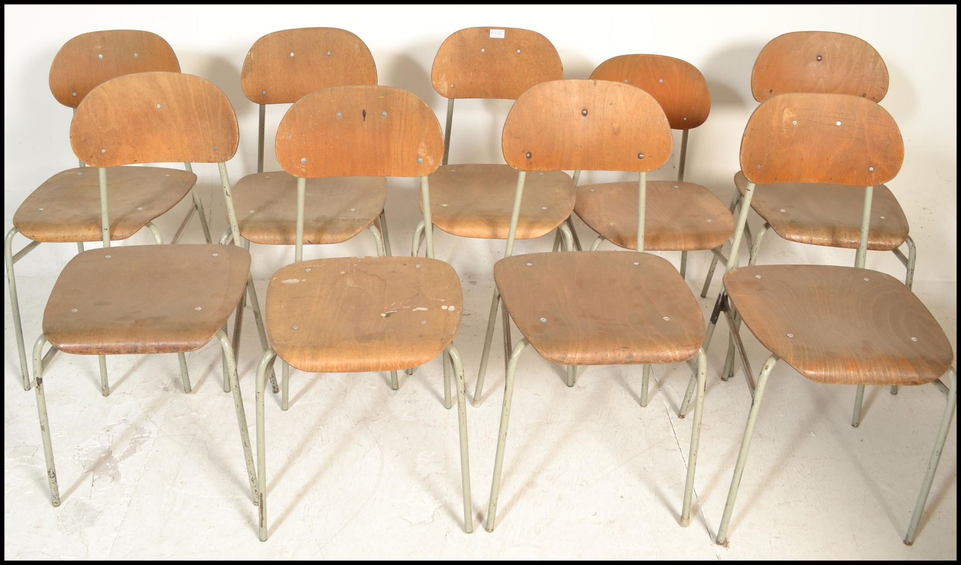 A set of 9 mid 20th century bentwood and tubular metal industrial stacking chairs. Each with painted - Image 2 of 5