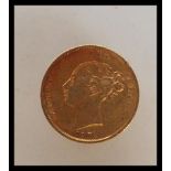 A Victorian 22ct gold 1872 gold half sovereign having a young Victoria head facing left with a