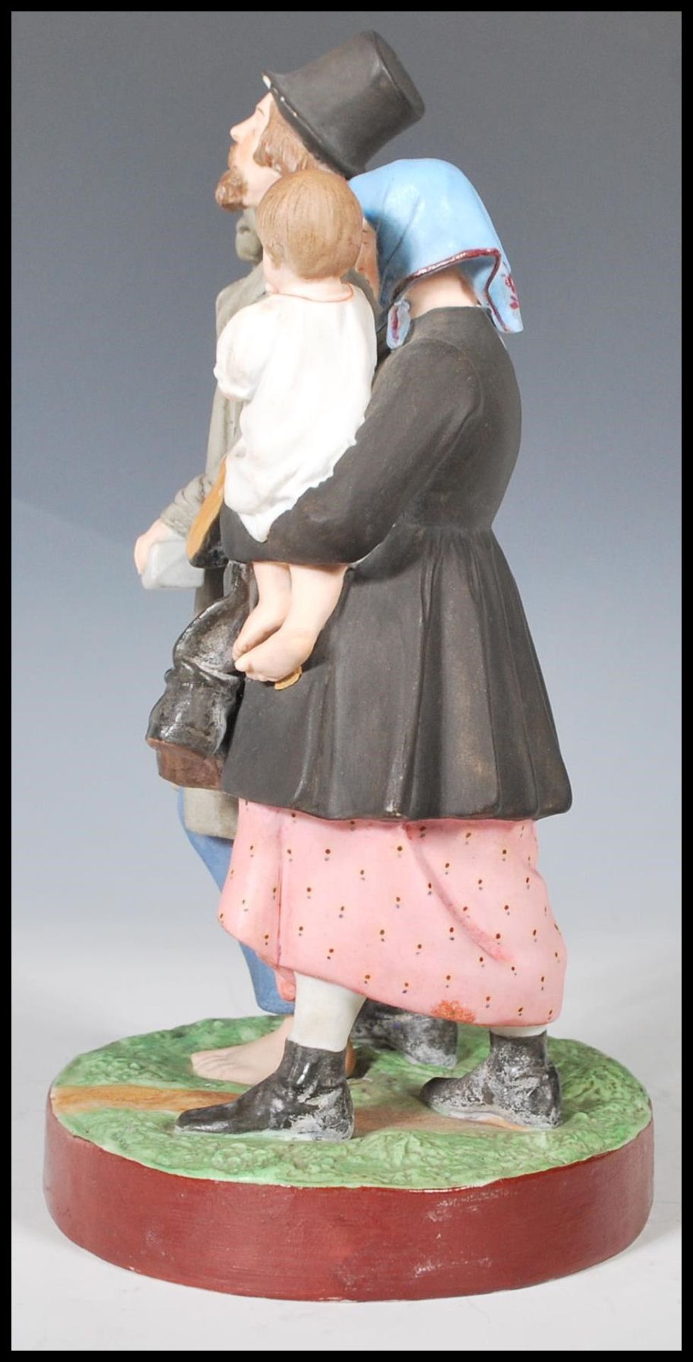 A 19th Century Russian Gardner bisque figurine group depicting a man with one boot and a bottle in - Bild 4 aus 10