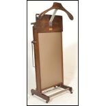 A vintage mid 20th Century Corby of Windsor trouser press valet stand constructed from wooden panels