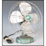 A vintage mid 20th Century industrial McGraw Electric Company 'Zero' desk fan model number 1250R,