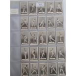 A full set of 100 Gallaher's Famous Cricketers cigarette / trade cards preserved in plastic