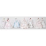 A collection of Royal Worcester ceramic figurines modelled as ladies to include The First