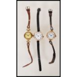 A group of three hallmarked 9ct gold ladies wrist watches dating from the 19th Century. Two having