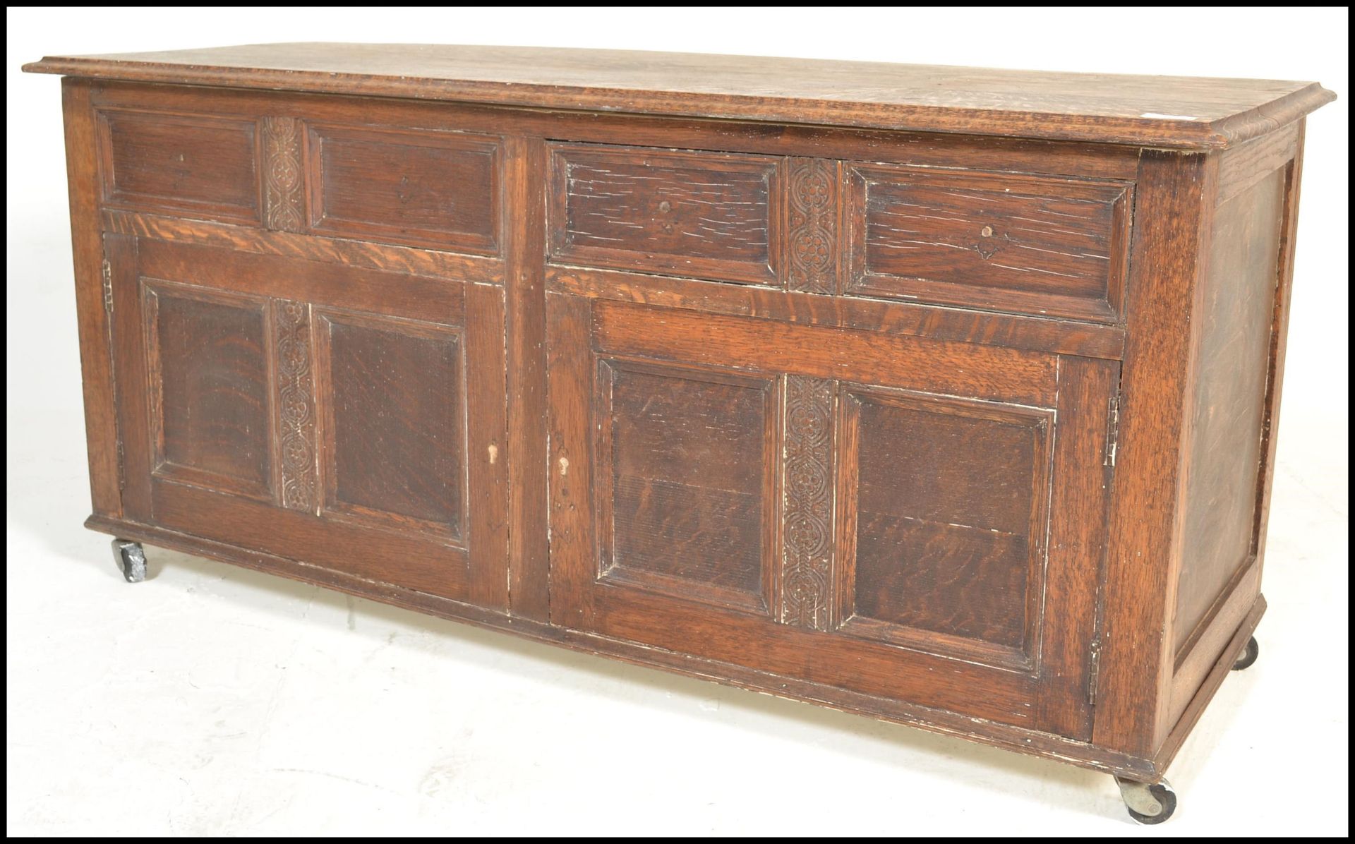 A 20th Century Jacobean revival panel oak coffer chest, panel sides and front with hinged top raised - Image 5 of 9