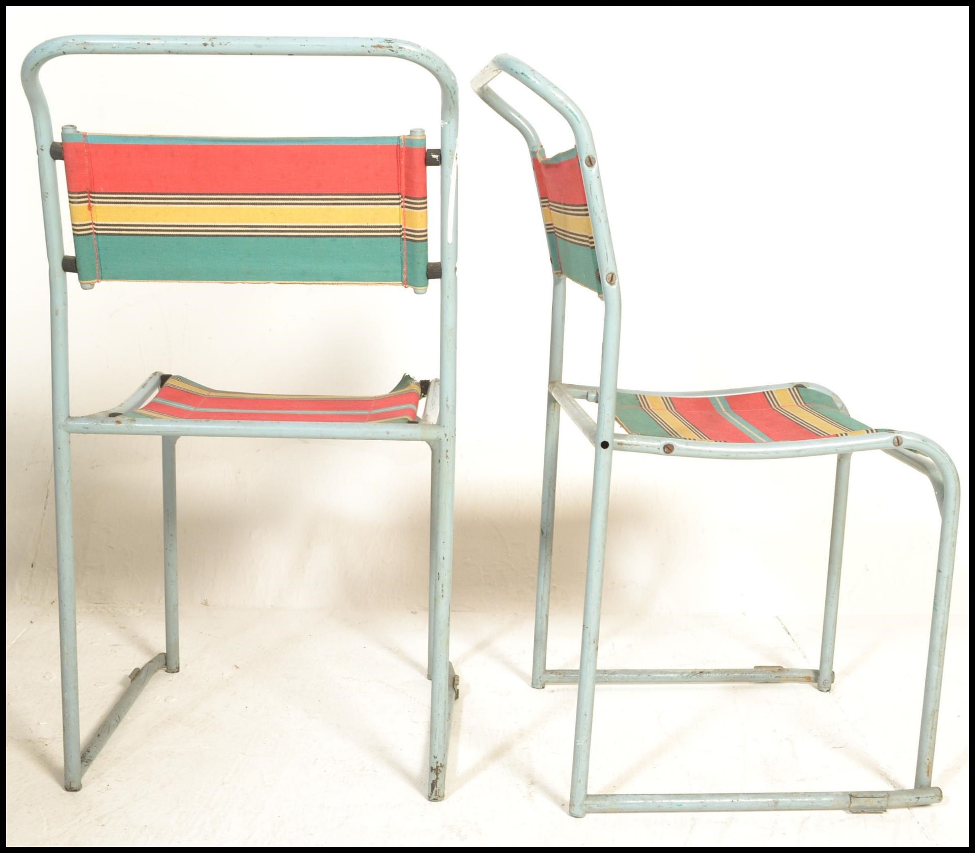 A pair of vintage mid 20th Century metal tubular village hall dispersal chairs, upholstered with a - Bild 3 aus 5