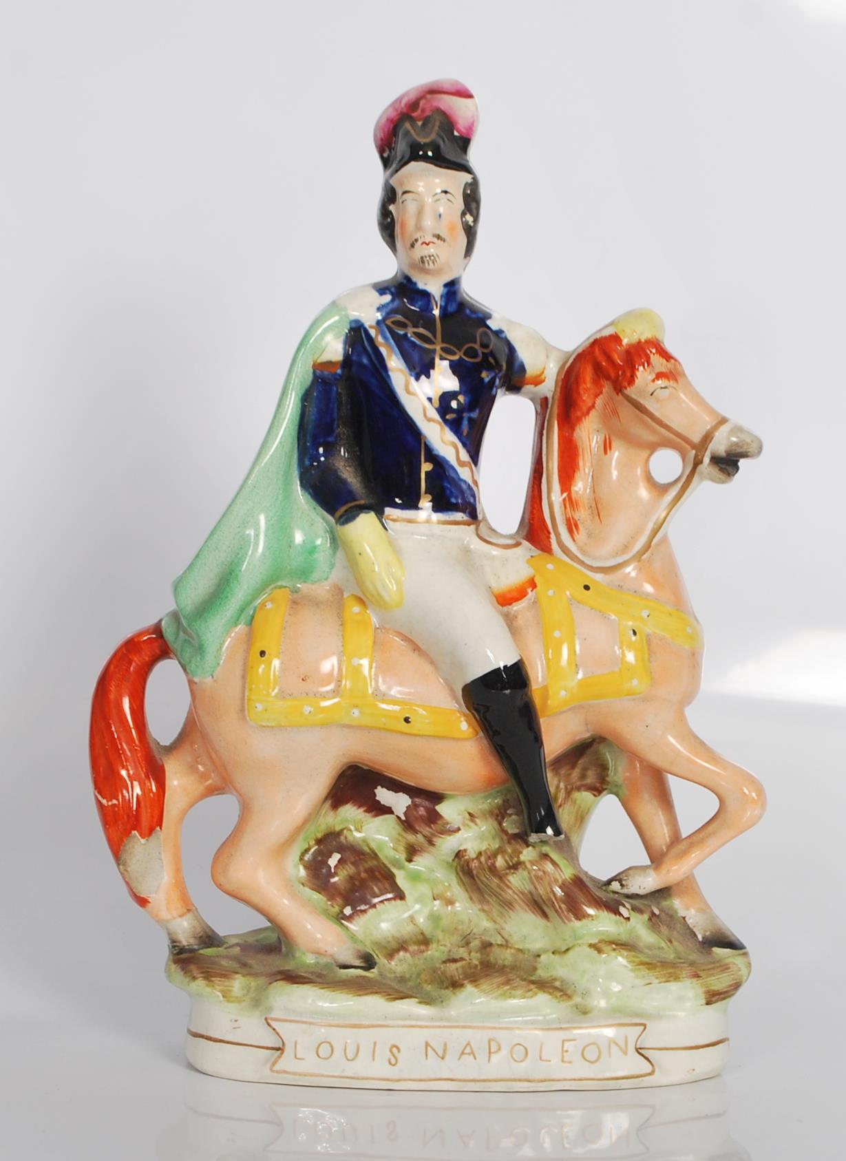 A 19th century Staffordshire flatback figurine of Louis Napoleon Emperor  of France on horseback.