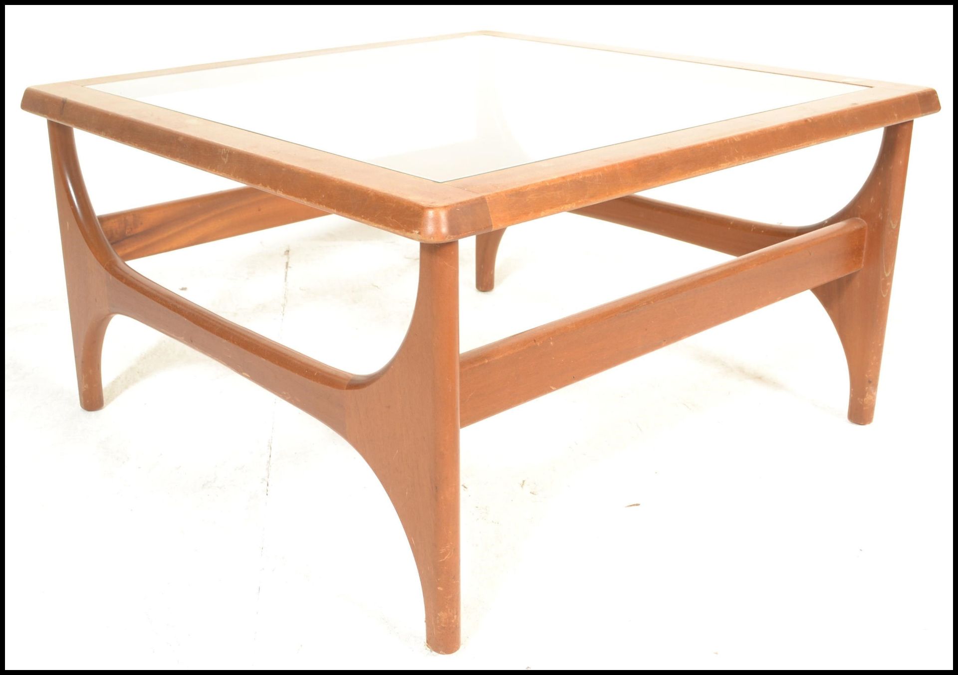 Stonehill- Stateroom- A retro mid 20th Century teak wood coffee table of square form having inset
