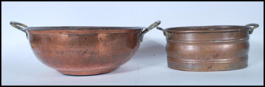 Two 19th Century copper cooking pans to include a large preserve pan of bowl form having brass