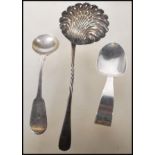 A selection of English hallmarked silver spoons to include a gadrooned caddy spoon (hallmarked