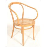 A vintage retro 20th century bentwood elbow bistro armchair in the manner of Thonet, the bentwood