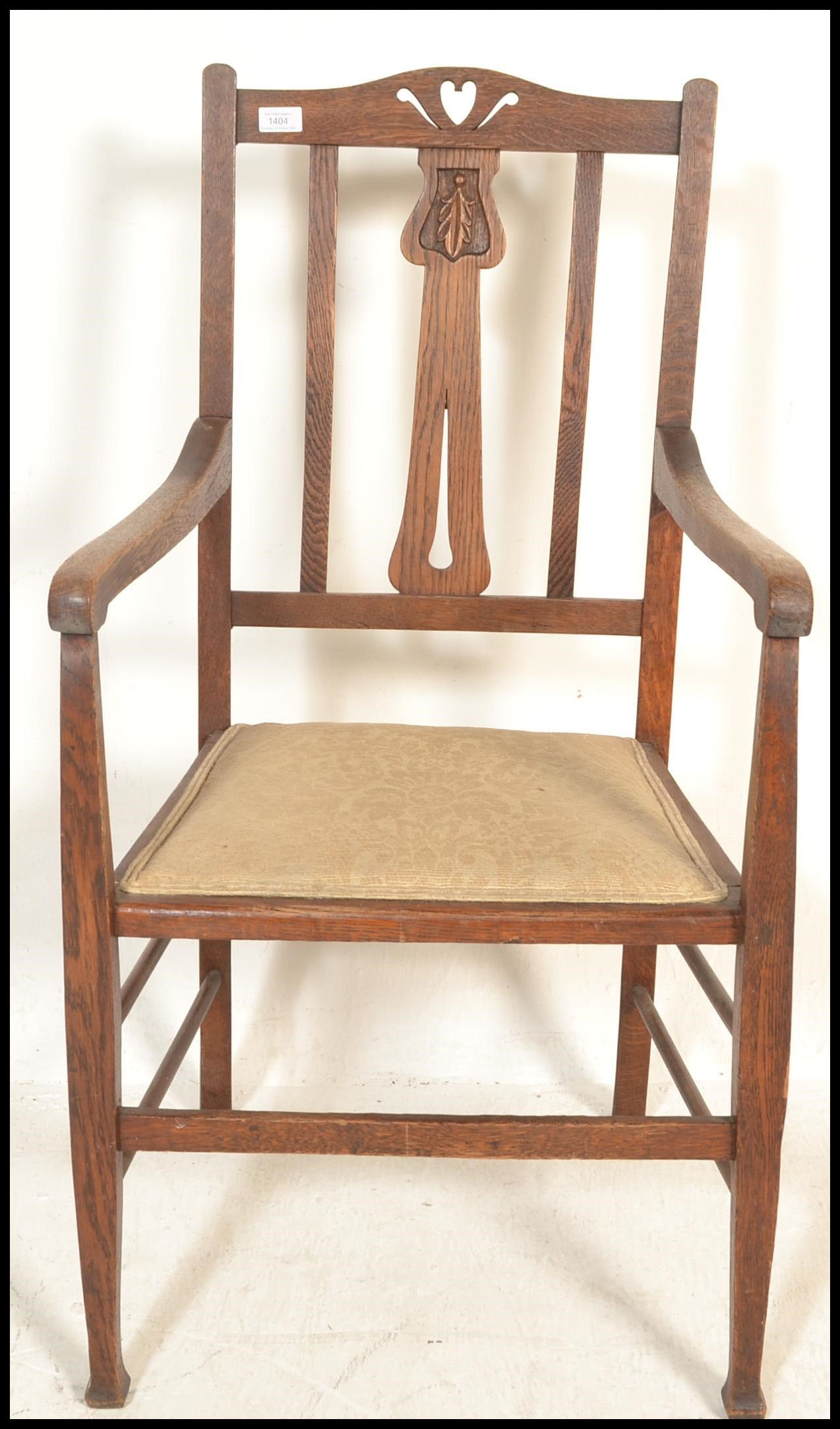 A late 19th / early 20th Century Art Nouveau oak elbow chair, pierced backrest over carved splatback - Image 2 of 5
