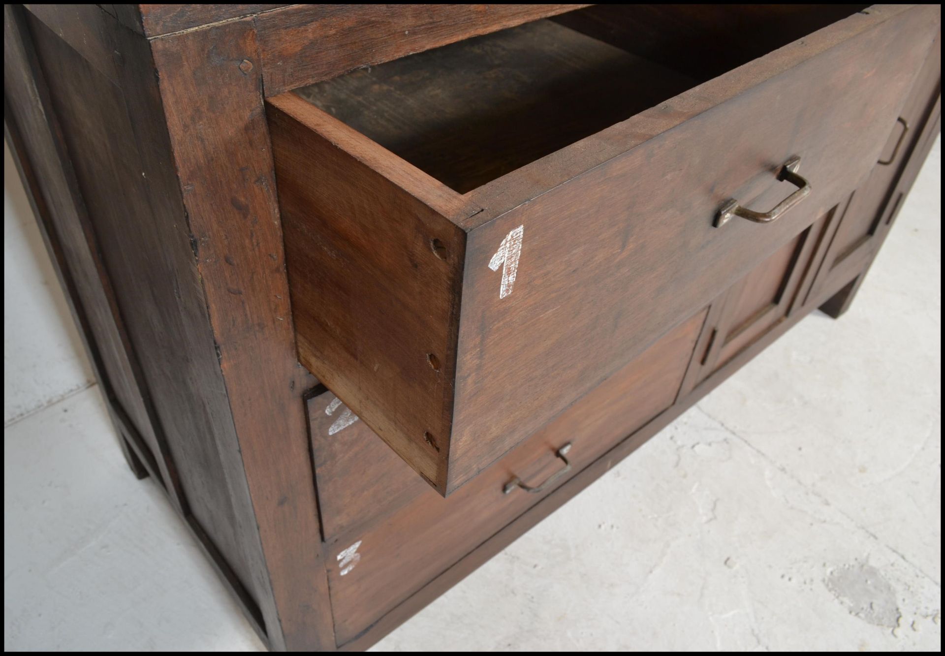 A pair of unusual 20th century hardwood sideboard cabinets of hardwood construction being raised - Bild 5 aus 17