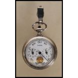 A vintage 20th Century French stainless steel cased pedometer having a white enamelled face with