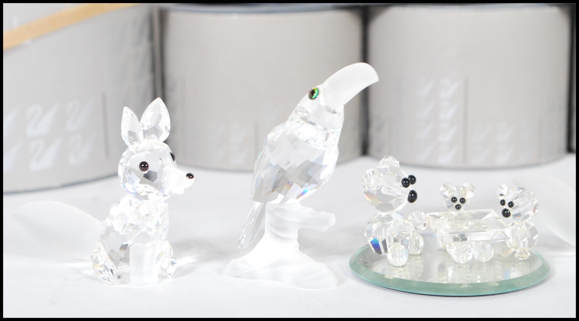 A collection of Swarovski crystal cut glass figurines to include the three bears, a toucan, a - Bild 2 aus 5
