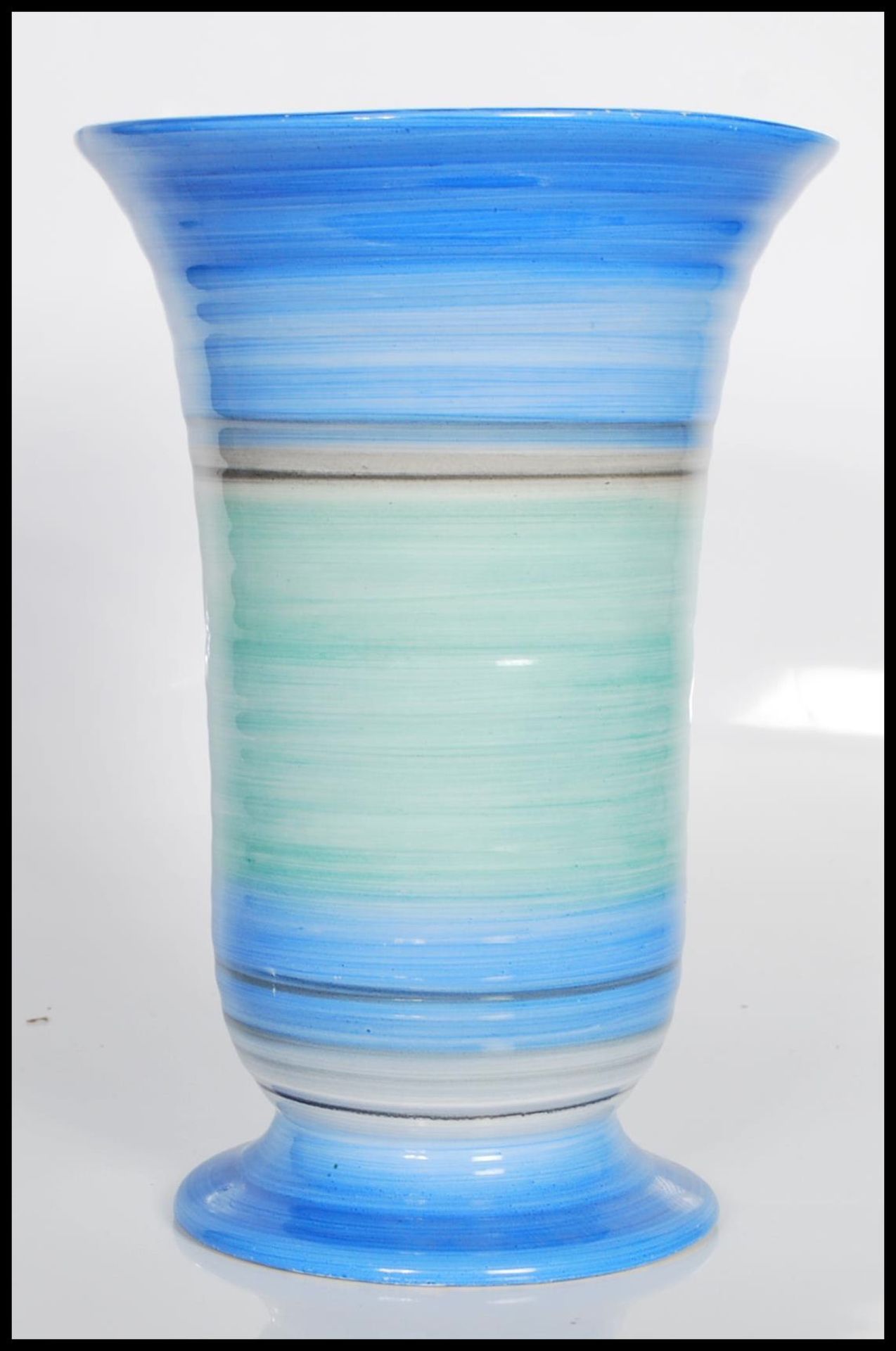An early 20th Century Art Deco vase by Shelley. The ribbed vase decorated in pale blue, green to - Image 2 of 6