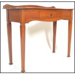 A 19th Century Victorian mahogany hall / console / side table. Fitted carved frieze of arch form