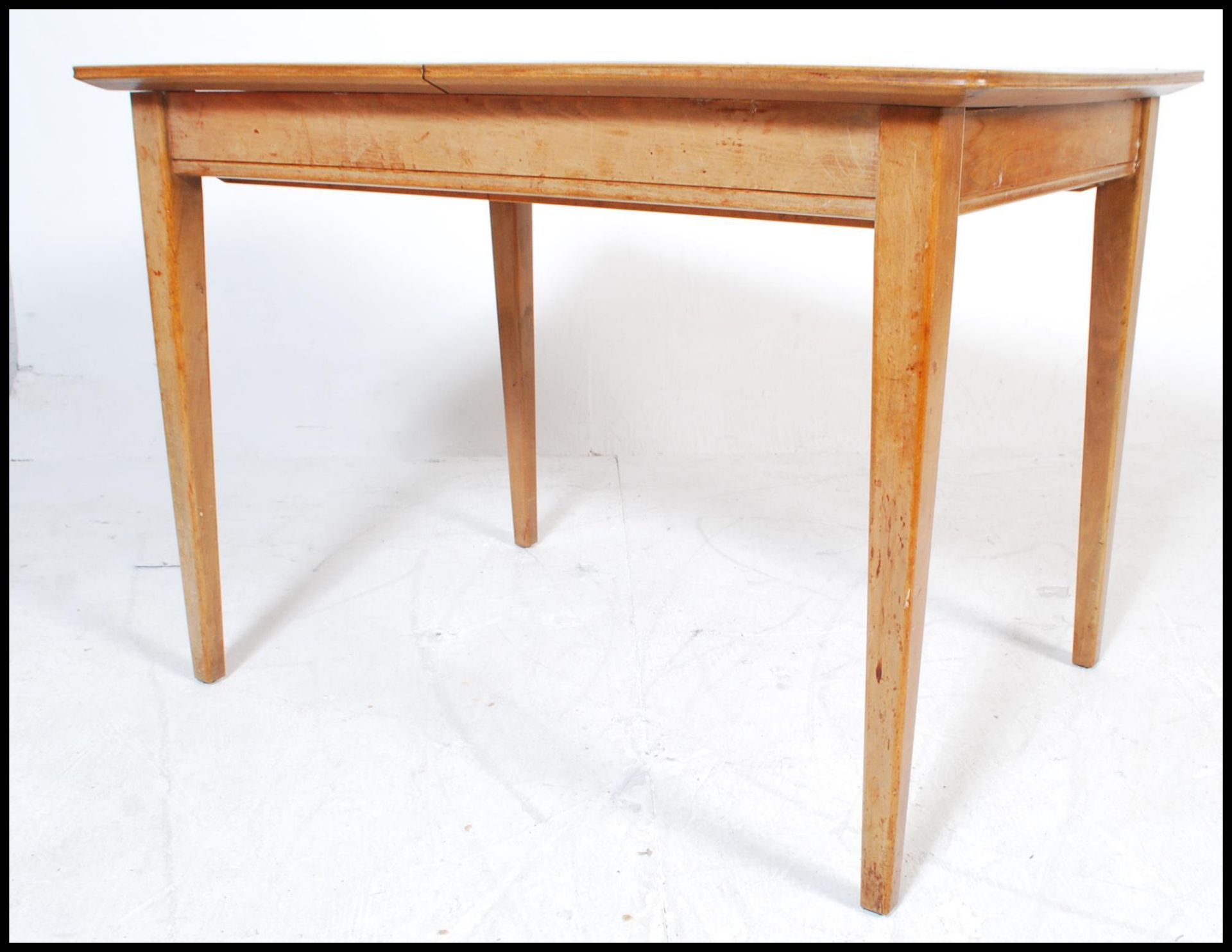 A mid 20th Century Gordon Russell walnut dining suite, comprising extending dining table, 79cm - Image 5 of 5