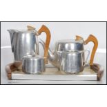 A vintage retro mid 20th Century Picquot Ware coffee/ tea service made from stainless steel and