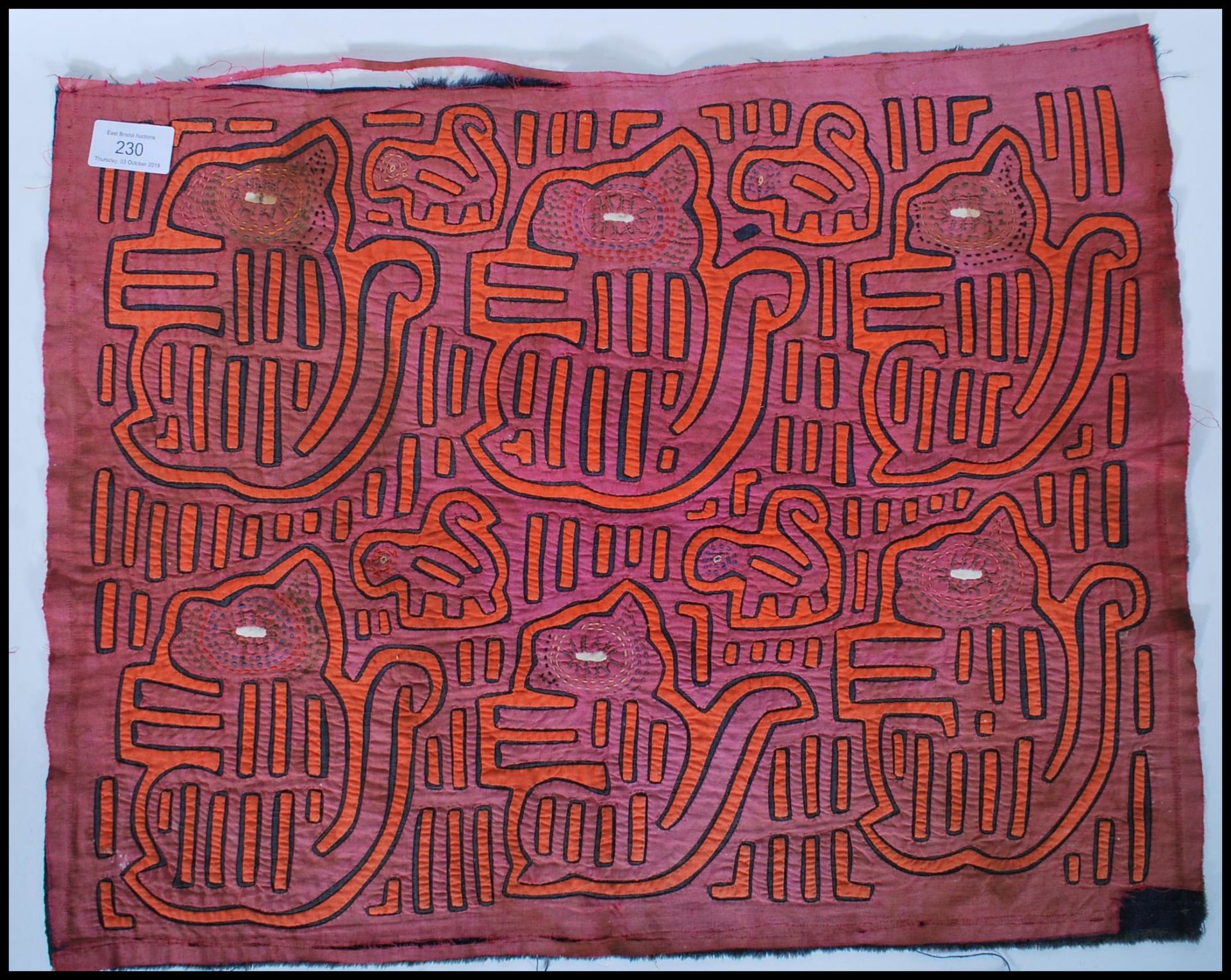 A 20th Century Panamanian Kuna Indian tribal mola fabric panel constructed from layers of