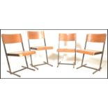 A set of 4 mid 20th century Art Deco style bentwood and tubular metal industrial stacking chairs.