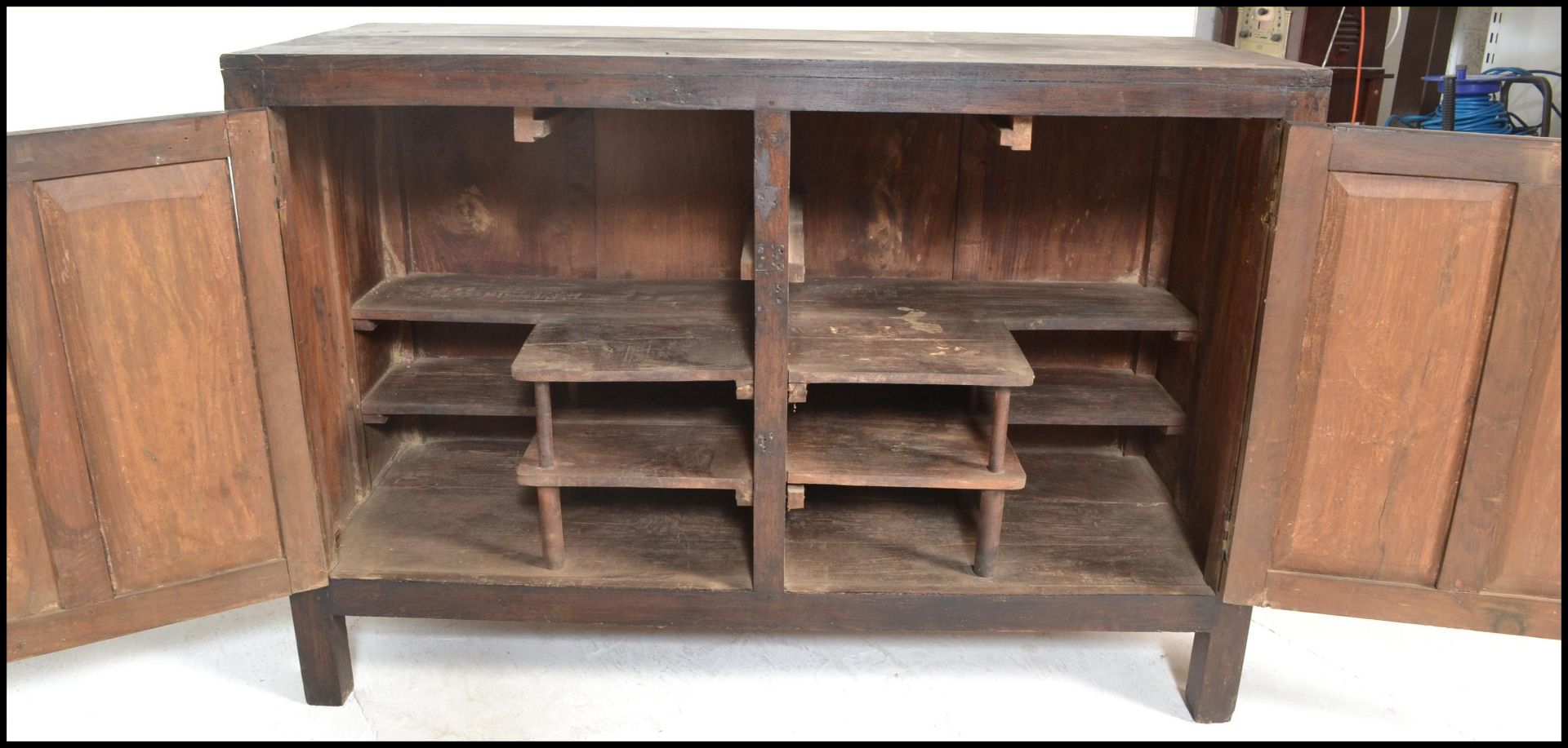 A pair of unusual 20th century hardwood sideboard cabinets of hardwood construction being raised - Bild 9 aus 17