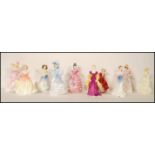 A collection of Royal Doulton ceramic figurines to include Flowers of Love - Forget Me Nots  HN 3700