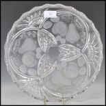 A 20th Century cut glass centrepiece plate in the manner of Lalique being of round form having a